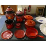 A Collection of Red Glazed Kitchenwares to Include Two Rumtopf Jars, Saucepans, Plates etc