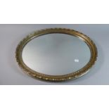 A Gilt Framed Oval Mirror, 55cm High