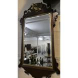 A Reproduction Mahogany Framed Georgian Style Fretwork Mirror with Gilt Cherub Mount, 100cm High