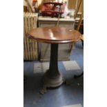 A Circular Topped Cast Metal Based Tripod Pub Table, 59cm Diameter