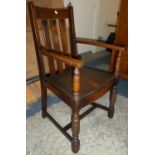 An Edwardian Oak Framed Armchair