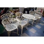 A Circular Pierced Topped Metal Table and Four Metal Garden Chairs Together with Tripod Torchere