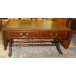 A Tooled Leather Topped Drop Leaf Coffee with Two Drawers Matched by Dummies, 91cm Wide (When