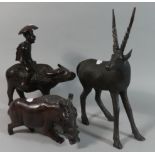 A Collection of African and Far Eastern Carved Ornaments to Include Warthog, Antelope and Gent