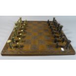 A Brass Chess Set and Moulded Chess Board c.1970