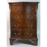 A Reproduction Serpentine Front Crossbanded Mahogany Chest of Four Drawers on Bracket Feet, 49cm