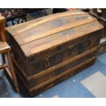 A Good Quality Leather Covered and Wooden Banded Dome Top Travelling Trunk, 88cm Wide