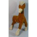 A Vintage Merrythought Horse, One Ear Missing