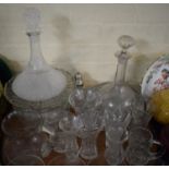 A Tray of Moulded Glass to Include Decanters, Jugs, Bowls, Vases