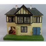 A Vintage Triang Dolls House, 45cm Wide (Some Furniture)