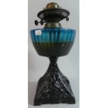 A Late Victorian Pierced Iron Based Oil Lamp With Blue Glass Reservoir