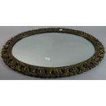 An Oval Wall Mirror with Pierced Gilt Frame, 63cm Wide