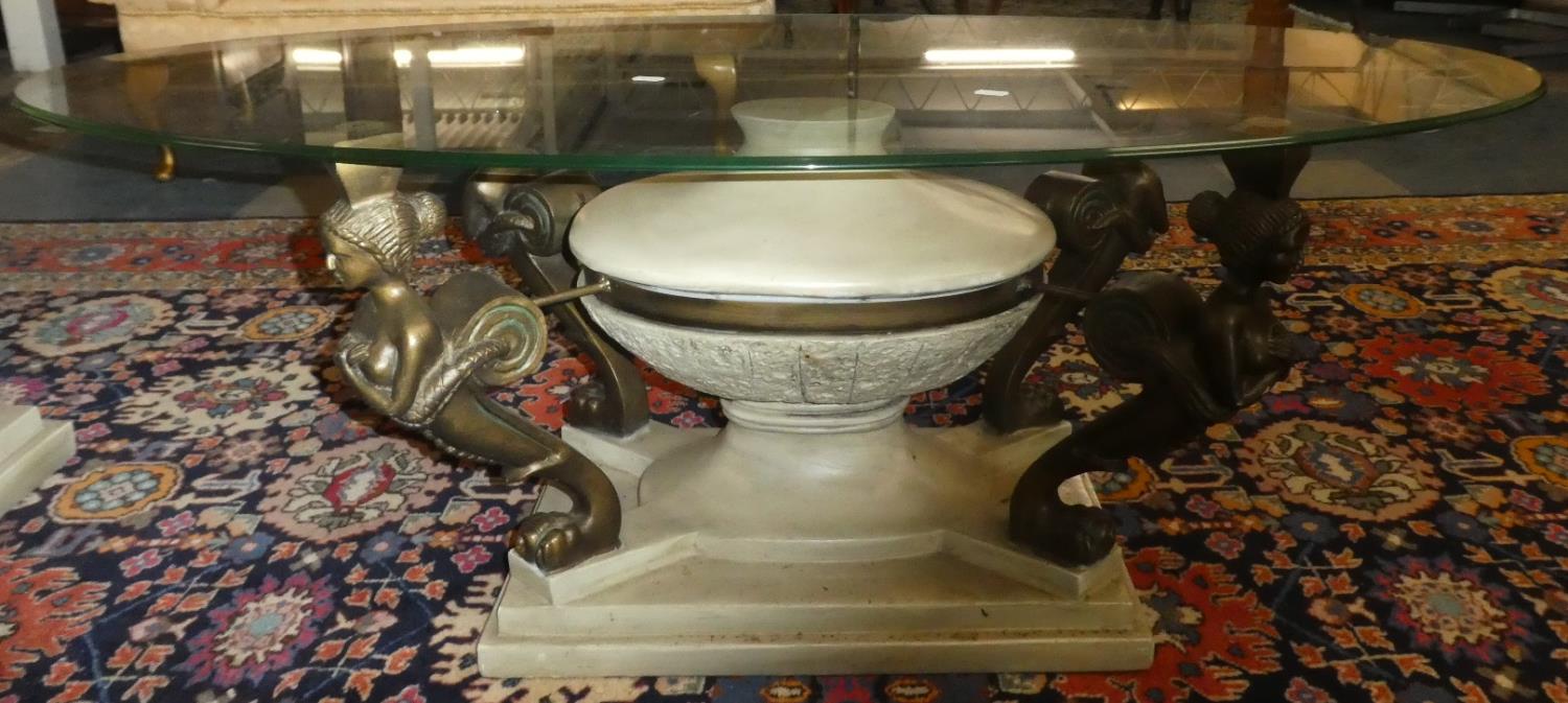 A Reproduction French Second Empire Style Oval Glass Topped Coffee Table with Maiden Supports, 120cm