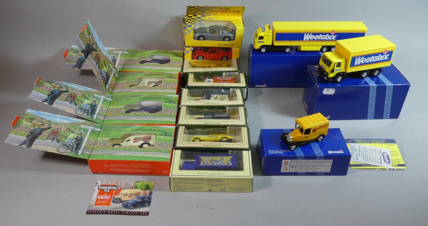 A Collection of Fifteen Boxed Diecast Toys to Include Yorkshire Tea, Weetabix, Maisto etc