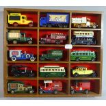 A Wooden 15 Display Section Containing Diecast Models of Vintage Buses