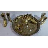 A Circular Niello Style Brass Plaque Together with a Collection of Brass Shoe and Boot Ornaments
