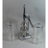 A Pair of Modern Wine Society Bottle Coolers and a Chromed Juice Press