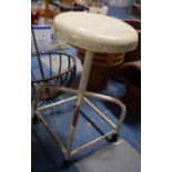 A Vintage Metal Framed Swivel Top Adjustable Work Stool Together with a Wrought Iron Hanging Basket