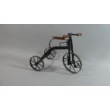 A Metal Dolls Tricycle, 23.5cm high