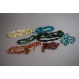 A Collection of Various Coloured Stone Necklaces, Russian Jadeite, Amber Chip etc