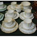 A "Pharos" Pattern Part Tea Set Comprising Five Trios, Cream and Sugar Saucer and Side Plate