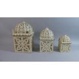 A Set of Three Graduated Pierced Metal Indian Style Lanterns, the Largest 30.5cm High