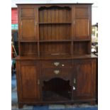 An Edwardian Oak Dresser with Raised Plate Rack Incorporating Cupboards Either Side, 152.5cm Wide