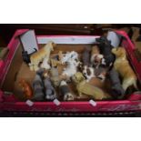 A Collection of Various Resin and Ceramic Dog Ornaments