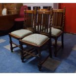 A Set of Four Oak Framed Barley Twist Edwardian Dining Chairs