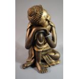 A Gilded Resin Study of Seated Thai Buddha Resting Head and with Eyes Closed, 28.5cm High
