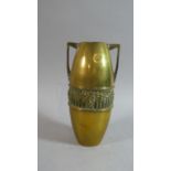 A Continental Late 19th/Early 20th Century Brass Vase with Two Stylised Handles and Central Vine