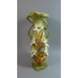 A Continental Art Nouveau Vase Decorated in Relief with Flowers, Some Petals AF, 41cm High