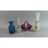 A Collection of Four Coloured Glass Vases