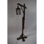 An Edwardian Stained Oak Adjustable Rise and Fall Lantern