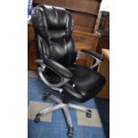 A Modern Leather Upholstered Swivel Office Armchair