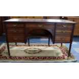 A Late Victorian/Edwardian Ladies Kneehole Writing Desk in Mahogany with Centre Drawer Flanked by