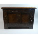 A Small Edwardian Oak Slipper Box with Carved Rails and Panelled Front, Hinged Lid, 45.5cm Wide