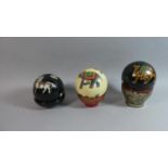 A Set of Three Modern North Indian Painted Balls Decorated with Horses, Elephant and Camels Set in