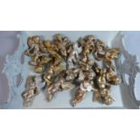 A Collection of Fourteen Gilt Decorated Hanging Cherub Ornaments, Each Approx 13cm high Together