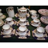 An Edwardian Part Tea Set Comprising Five Trios, Hot Water Jug, Cup and Saucer, Teapot (Spout AF),