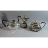 Two Edwardian Silver Plated Teapots and an Edwardian Silver Plated Hot Water Jug