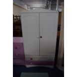A Modern White and Pink Child's Wardrobe with Two Base Drawers, 81cm Wide