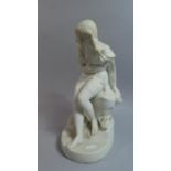 A Parian Study of a Seated Girl in Victorian Bathing Costume, 29cm High
