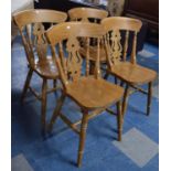 A Set of Four Late 20th Century Varnished Kitchen Chairs with Pierced Splats