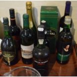 A Tray Containing Four Bottles of Sherry, One Bottle of Port, Two Bottles of Red Wine and Bottle