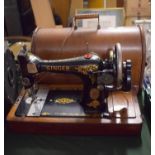 An Oak Cased Singer Sewing Machine