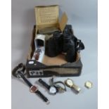 A Box Containing WWII Gas Mask, Modern 30x50 Zoom Binoculars, Collection of Wrist Watches etc
