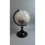 A Small Modern Table Globe on Ebonised Socle, 37cm high