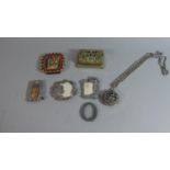 A Collection of Curios to Include Stamp Box, Pocket Watch Holder, Miniature Photo Frames etc