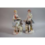 A Pair of Continental Figural Ornaments, Gent and Lady with Sheep, 26.5cm High